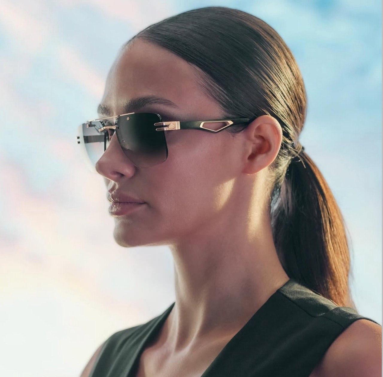 Woman wearing slim designer sunglasses